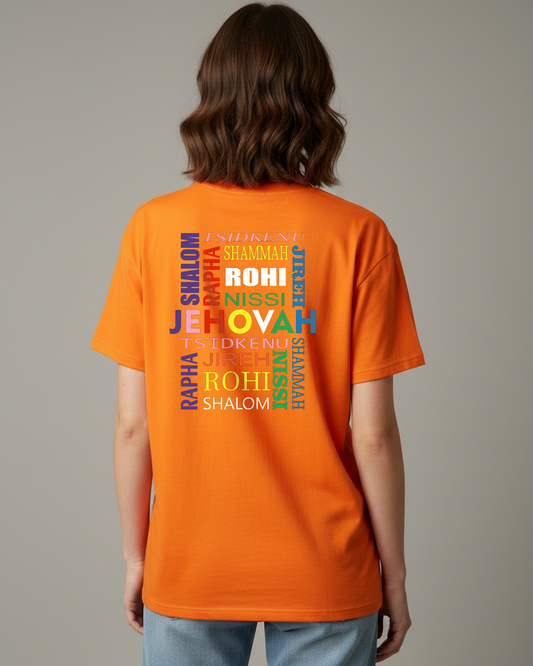 Woman wearing an orange t-shirt with Hebrew text printed on the back in different colors, against a beige background