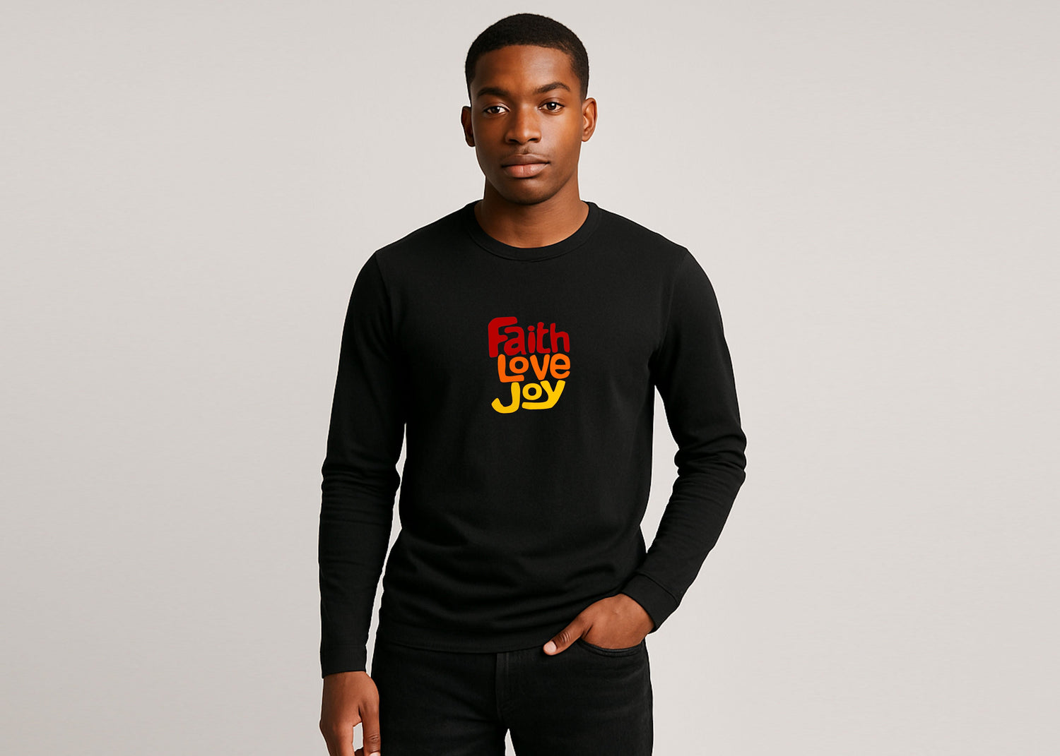 A man wearing a black long sleeve t-shirt with a "Faith Love Joy" logo