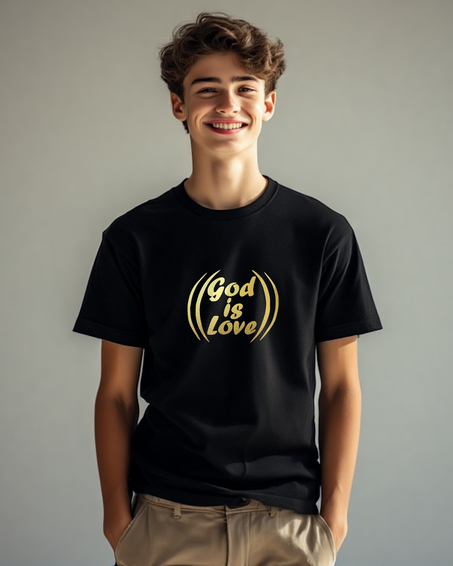A man wearing a black t-shirt with a gold "God is Love" logo printed on the front.