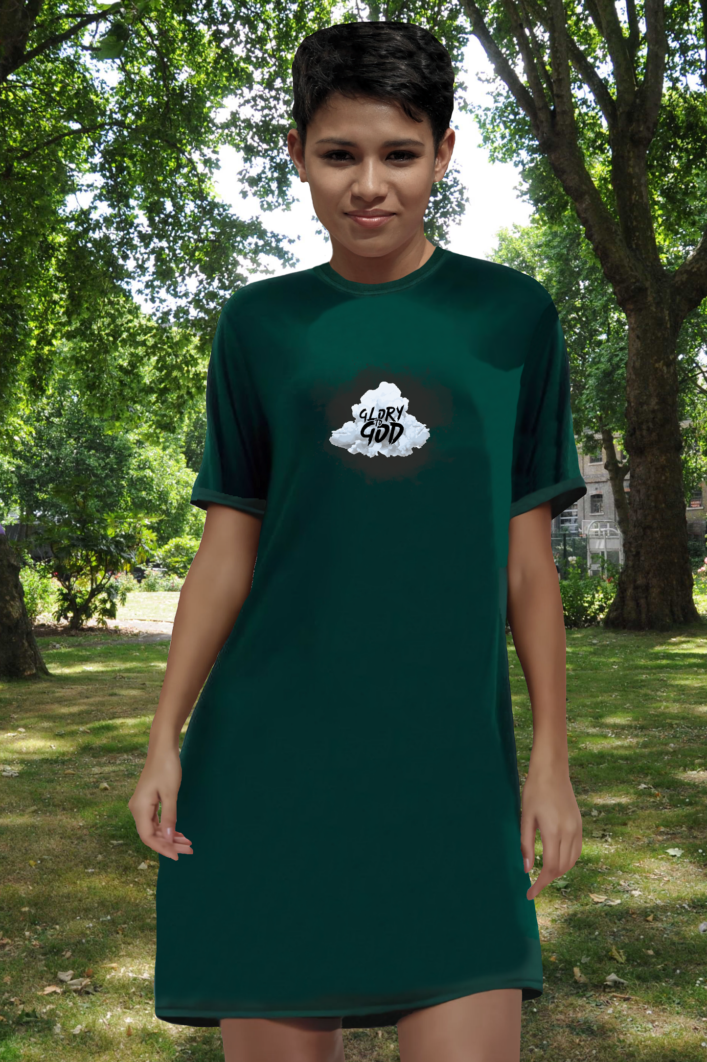 Woman wearing a green Heavenly Dreamwear t-shirt dress with a Glory to God cloud logo.