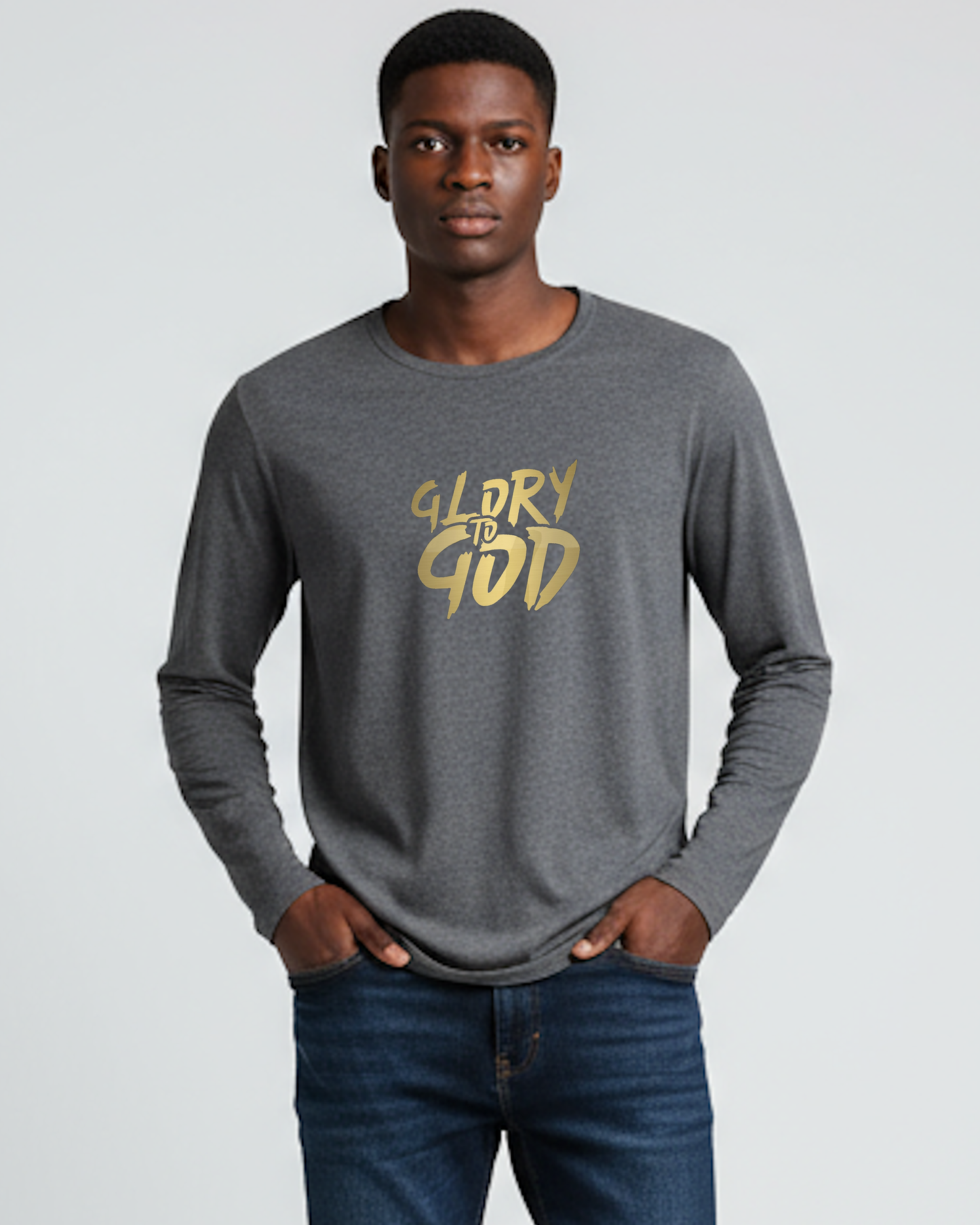 Man wearing a gray long-sleeve shirt with gold 'Glory to God' text on a plain background