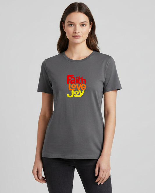 Woman wearing a gray t-shirt with 'Faith Love Joy' text on a plain background