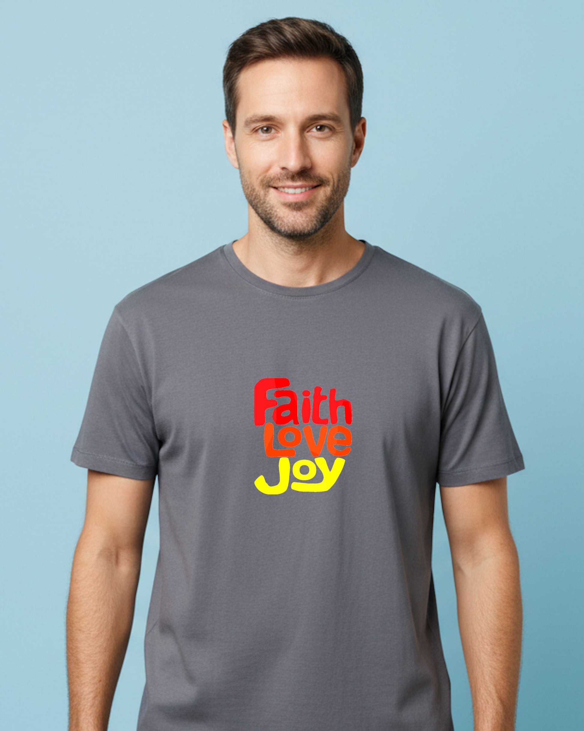 Man wearing a gray t-shirt with 'Faith Love Joy' text on a light blue background