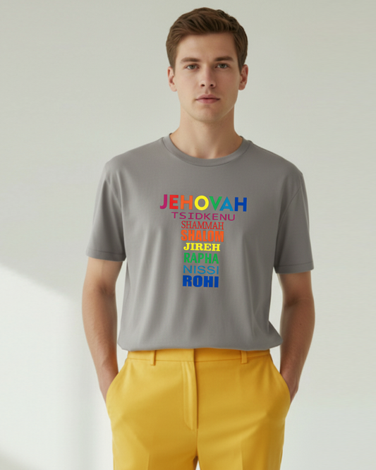 Man wearing a gray t-shirt with colorful Hebrew text design on a plain background