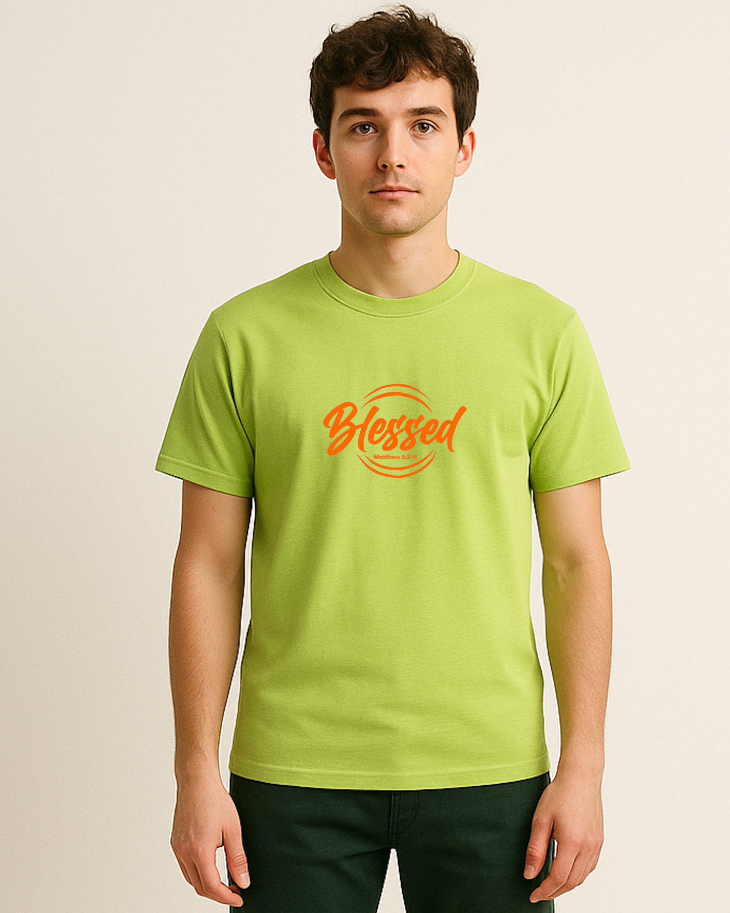 Person wearing a lime t-shirt with 'Blessed' printed in orange on a beige background