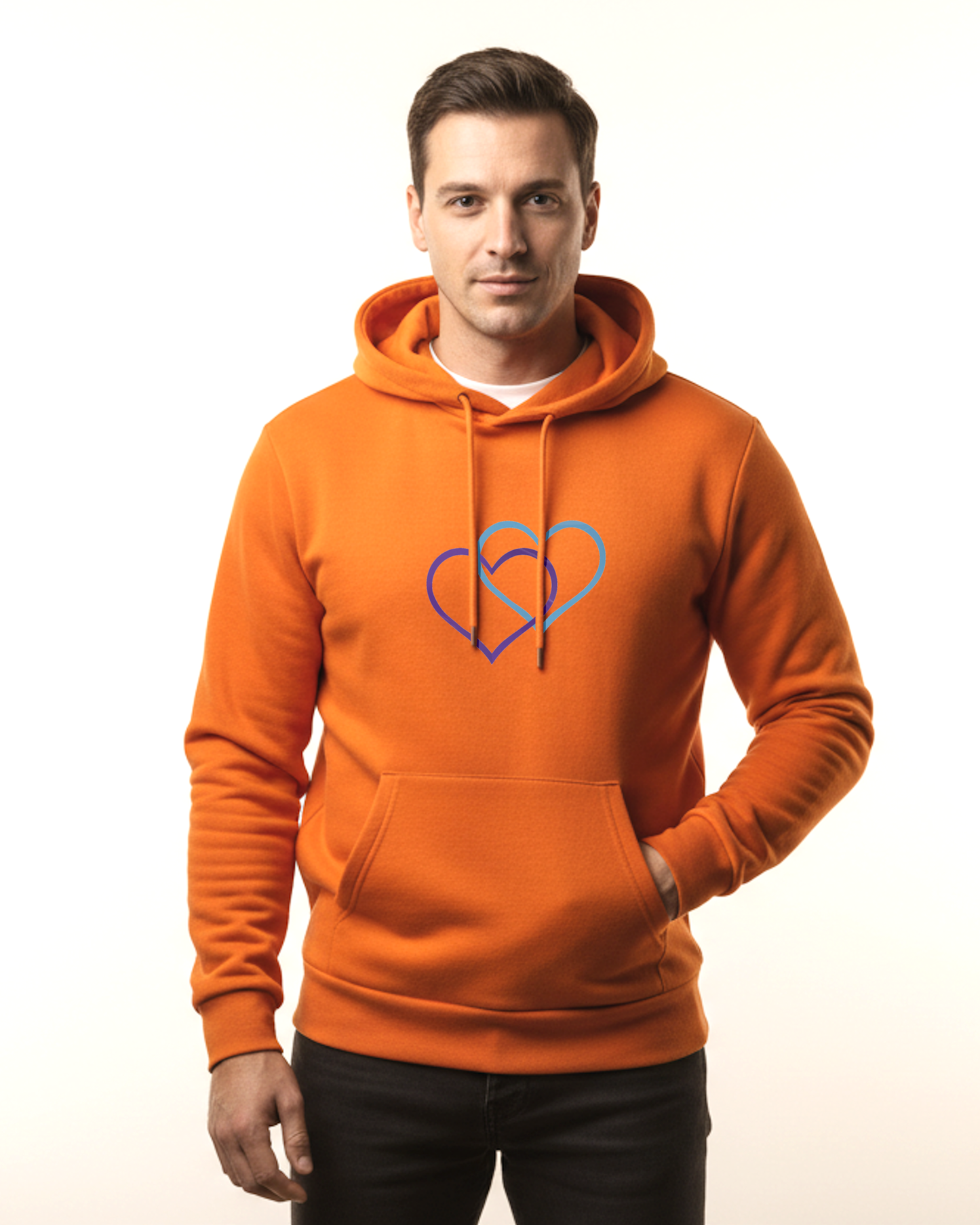 Man wearing an orange hoodie with a purple and cyan heart design against a white background.