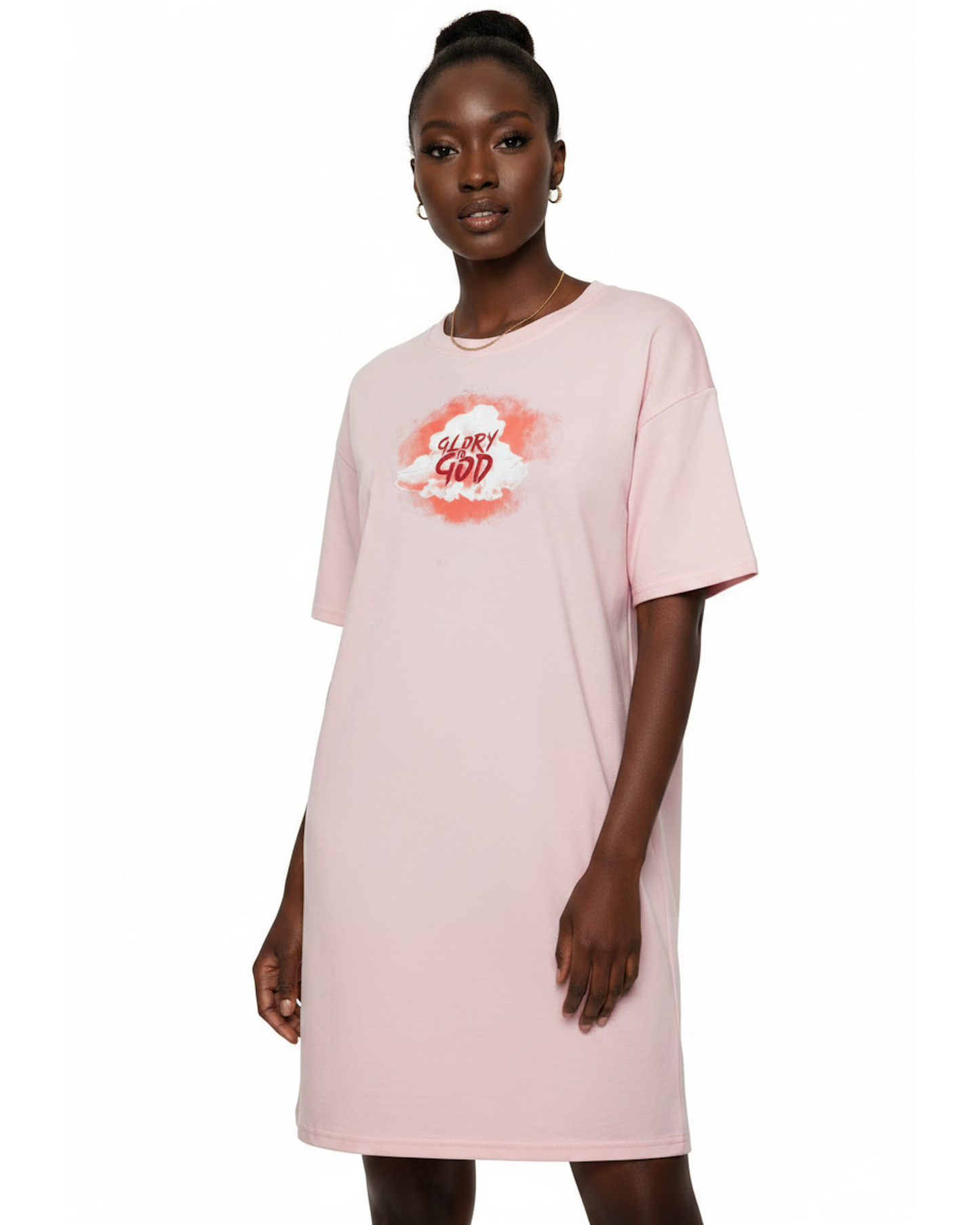 Woman wearing a light pink t-shirt dress with a graphic cloud logo printed on front against a white background