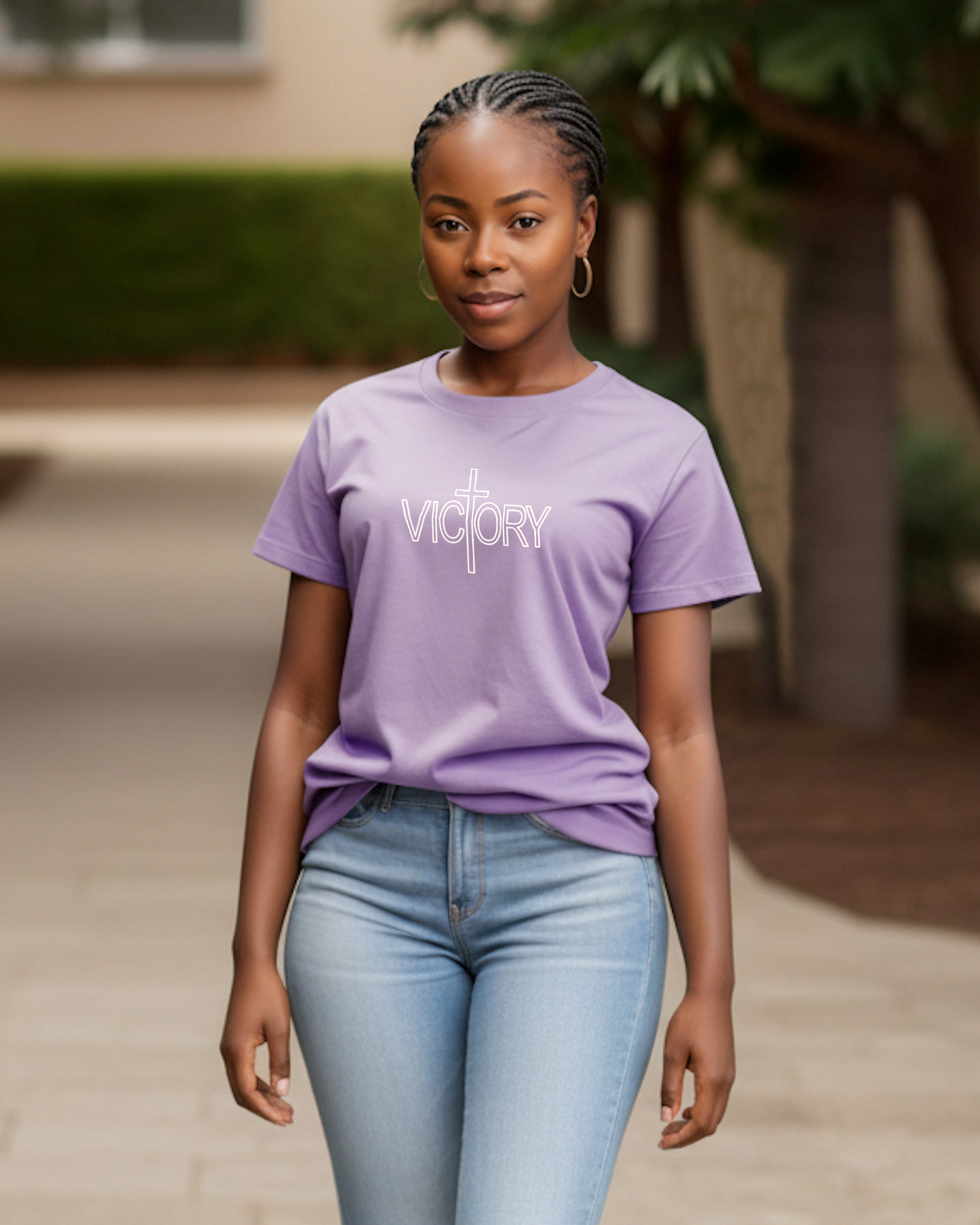 Woman wearing a purple 'Victory' t-shirt outdoors