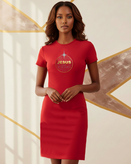 A woman modeling a bright red short-sleeve knee-length dress with a circular gold and white graphic on the chest that reads 'JESUS OF THE WORLD'. The background is a warm beige wall with gold geometric line details.