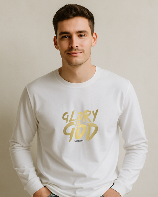A man wearing a white long-sleeve T-shirt with 'Glory to God' text on a plain background