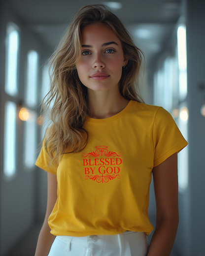 Woman wearing a yellow t-shirt with a red 'Blessed by God' text logo in a modern indoor setting